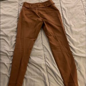 Brown slacks.